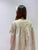 2108011 CMP Round Embroidery back Pleats OP - Beige