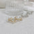 A22046 KR Pearls Half Ring Earrings